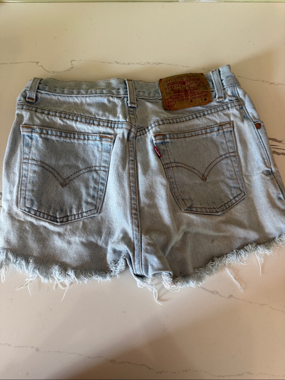 Levi's Light Blue Frayed Hem Denim Shorts